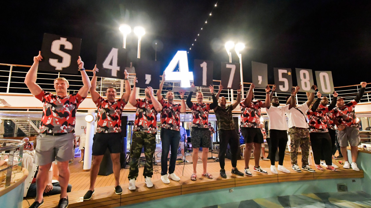 Cruise members depicting the $4.4+ million raised in fundraisers!