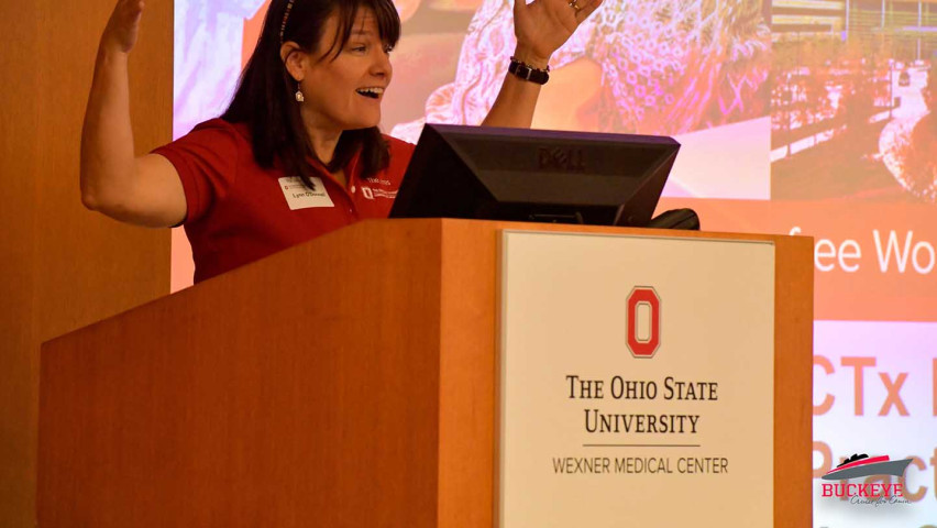 Photo of Director Lynn O'Donnell speaking